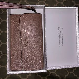 Kate Spade Glitter Medium Flap Phone Wristlet in Rose Gold